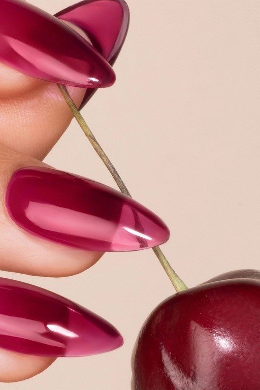 Glossy magenta raspberry jelly almond nails