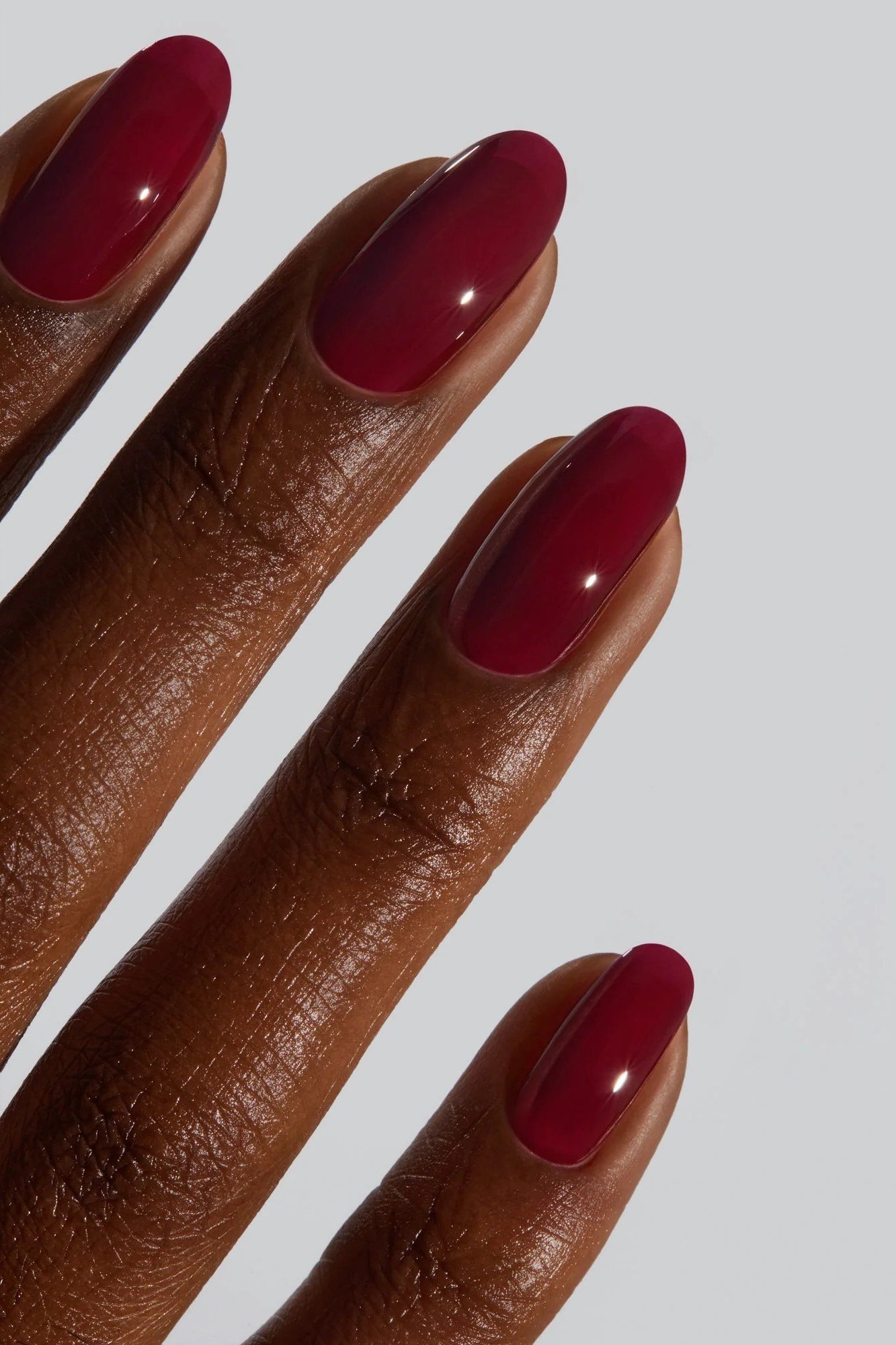 Cranberry red oval nails