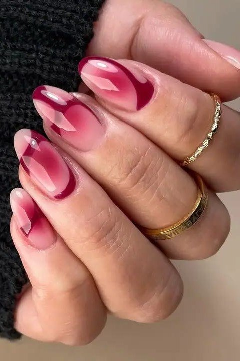 Magenta aura almond nails