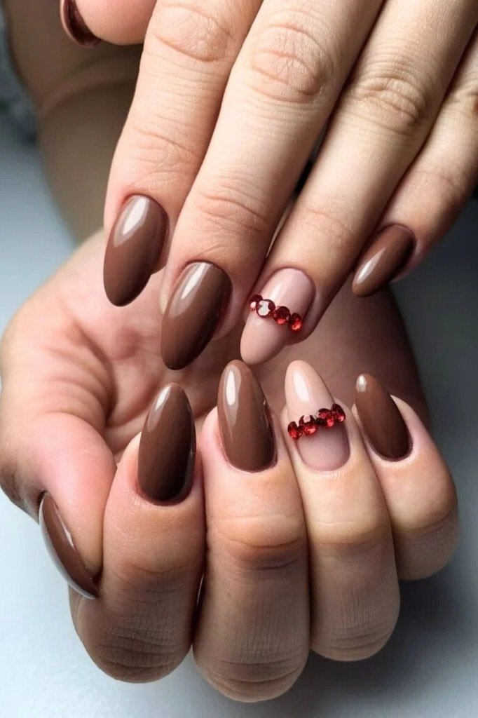 Chocolate brown oval nails with beaded accents