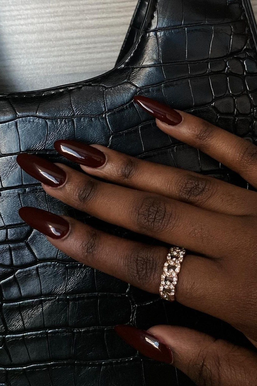 Rich black cherry almond nails