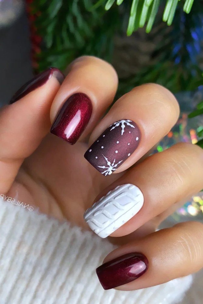 63. Wine and White Snowflake Knit Nails - cozy knit winter nails for women over 60