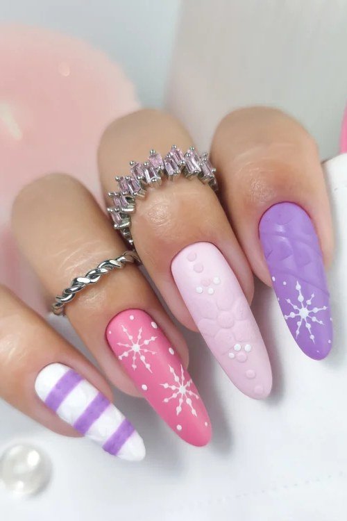 65. Pink and Purple Knit Nails with Snowflake - cozy knit winter nails for women over 60
