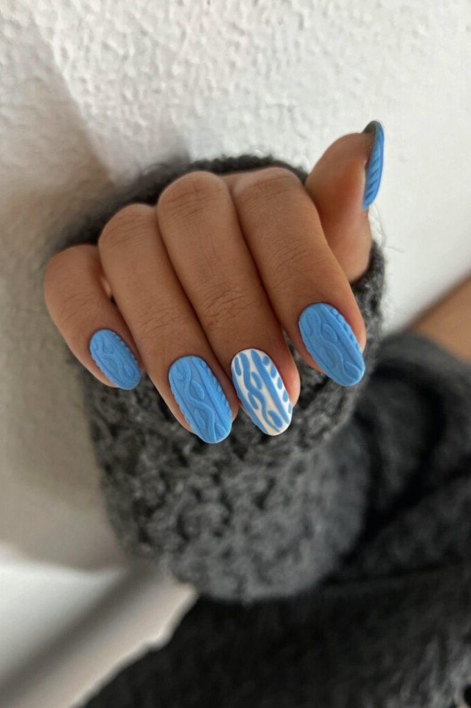 34. Sky Blue Cable-Knit Nails in a Sweater Cuff - cozy knit winter nails for women over 60