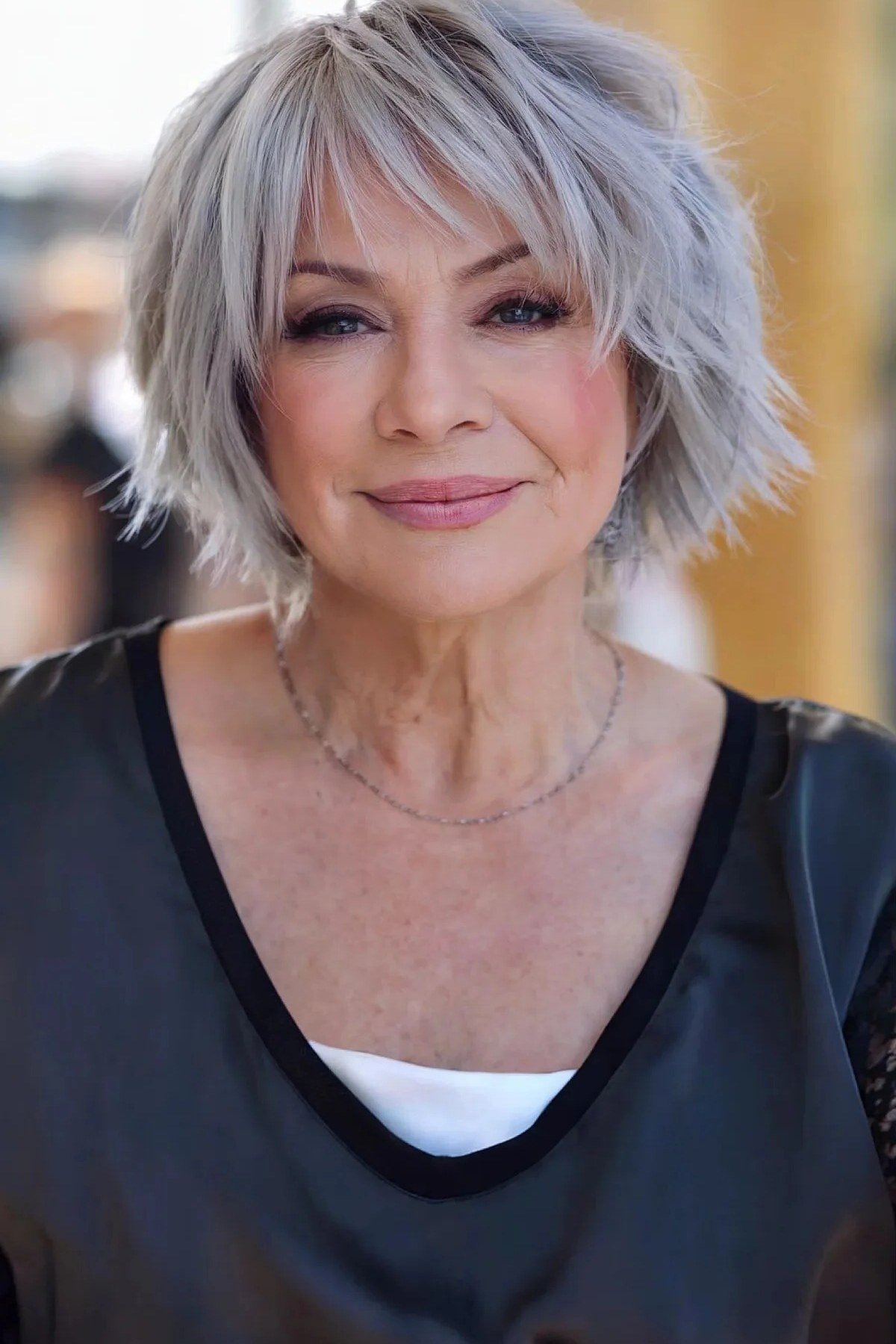 Tousled Silver Shaggy Bob with Bangs for women over 50 with thin fine hair