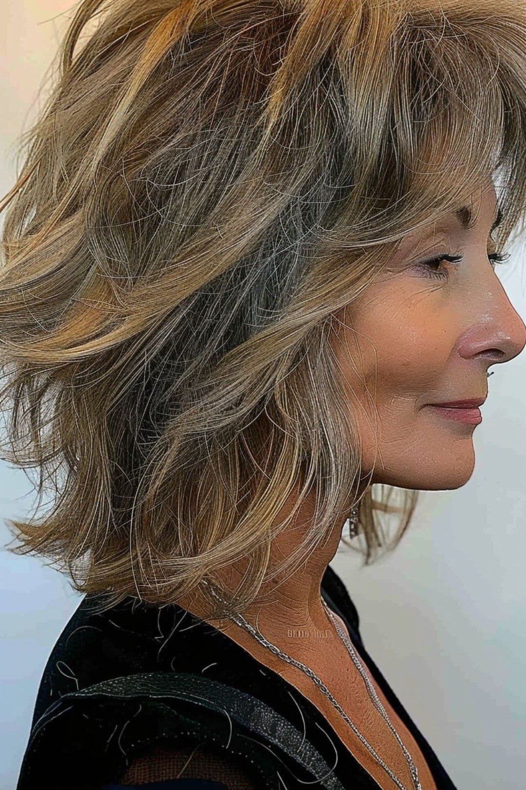 Brown Layered Bob with Face-Framing Highlights for women over 50 with thin fine hair