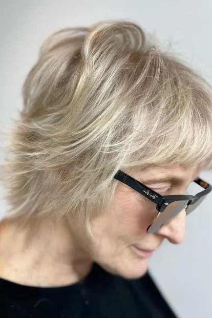 Blonde Shaggy Bob with Glasses for women over 50 with thin fine hair