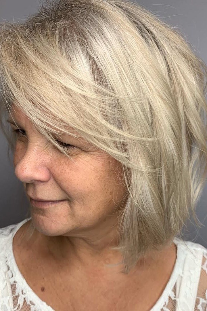 Blonde layered bob, three-quarter view, tousled texture for women over 40
