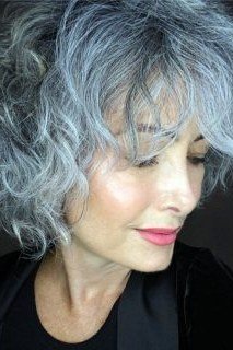 Silver shaggy bob, three-quarter view, choppy textured layers for women over 40