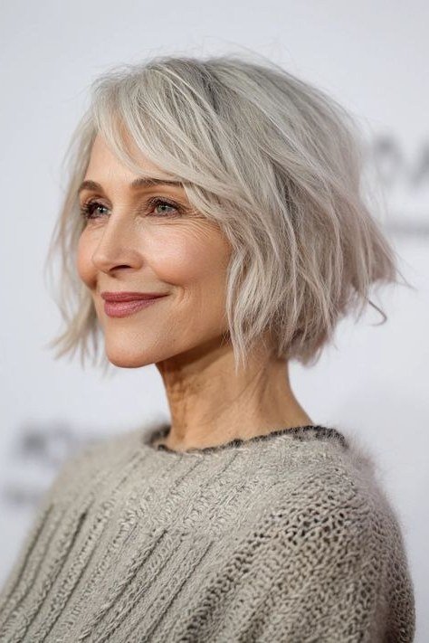 Silver layered bob, front view, polished blowout for women over 40
