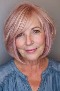 Pastel pink layered bob, front view, soft rose tint for women over 40