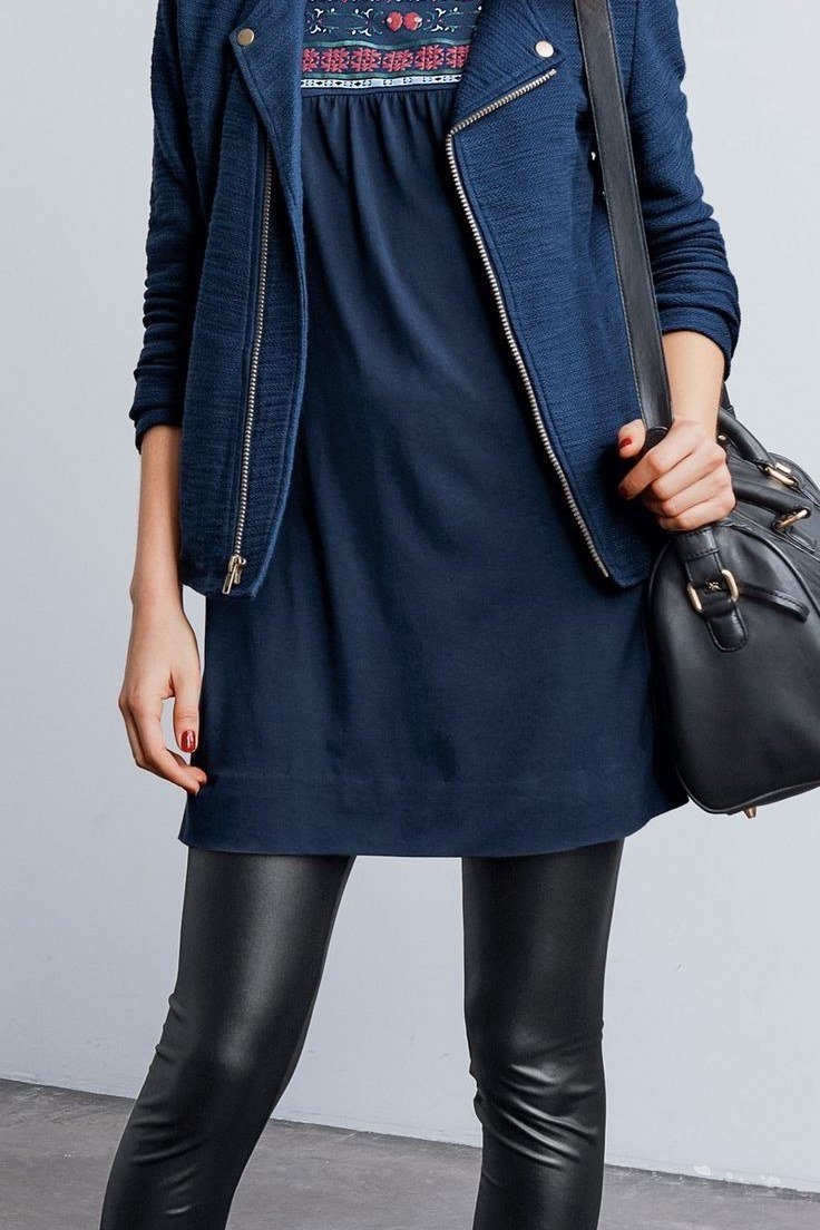 Navy moto jacket over navy dress, black leggings, black boots, leggings outfit idea for women over 50