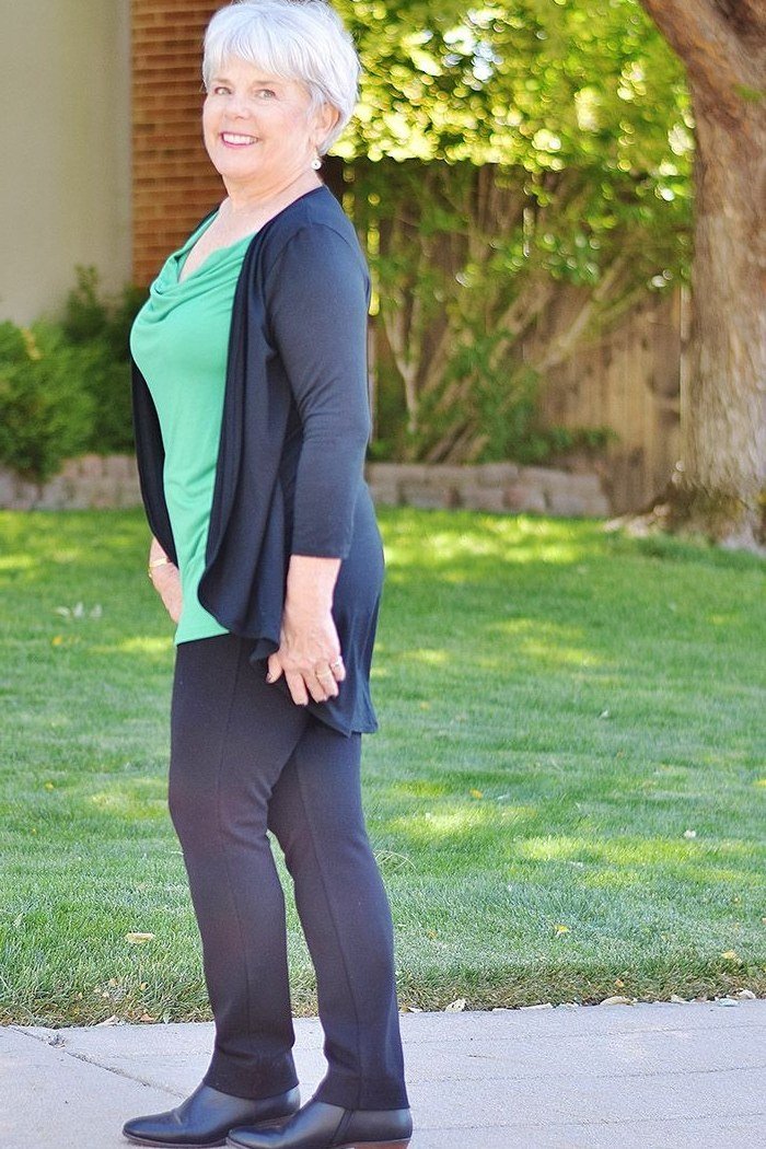 Navy cardigan over teal top, dark gray leggings, navy flats, lawn, leggings outfit idea for women over 50