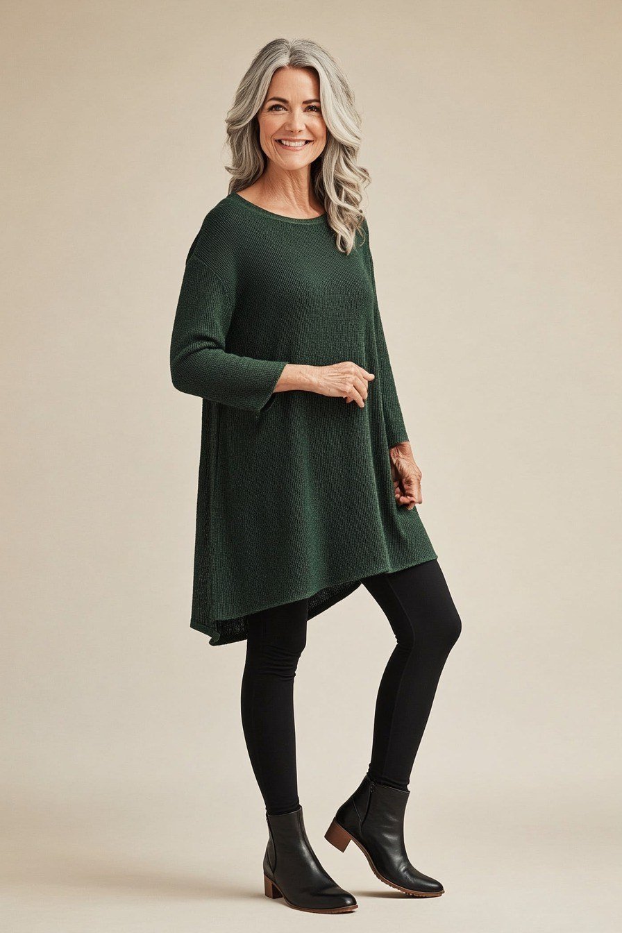 Forest-green tunic, black leggings, black booties, leggings outfit idea for women over 50