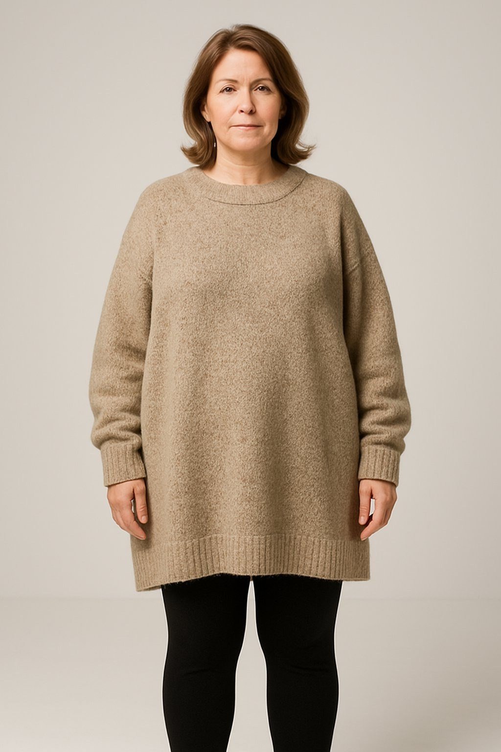 Camel oversized sweater, black leggings, studio, leggings outfit idea for women over 50
