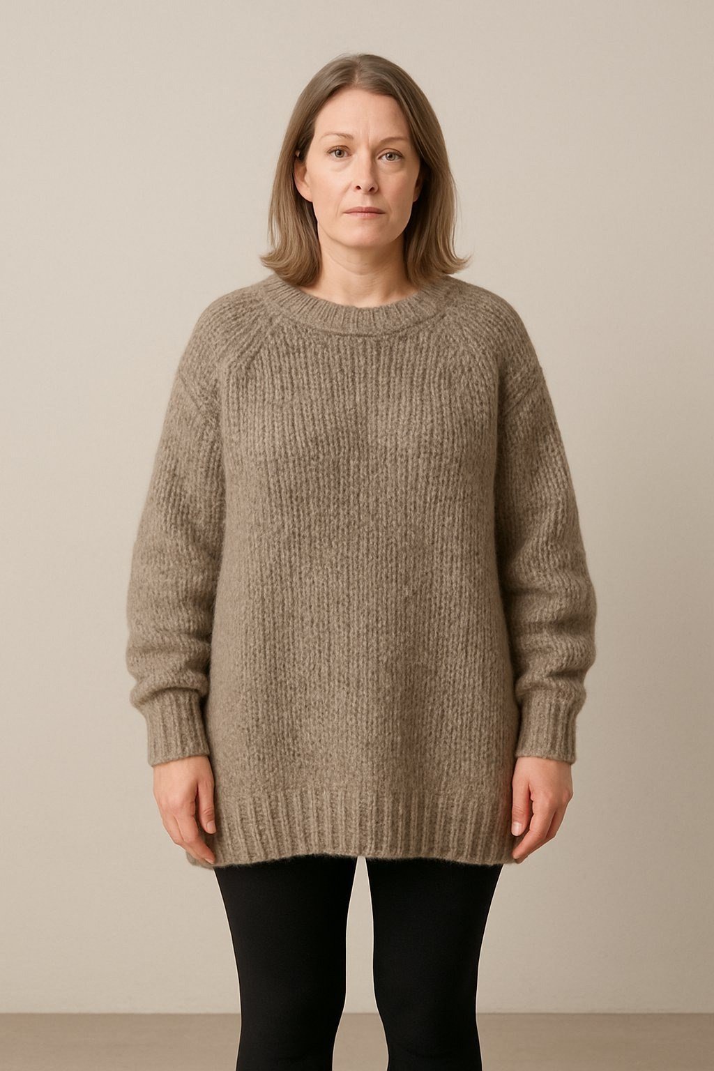 Taupe oversized sweater, black leggings, studio, leggings outfit idea for women over 50