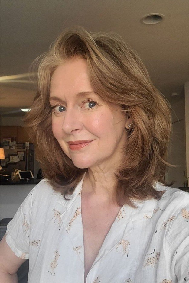 light brown wavy lob with easy waves, front view, low-maintenance hairstyle for women over 40