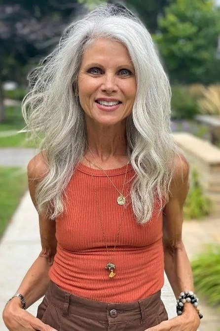 Silver Waves Outdoors - long hairstyle for women over 60 with thin hair (long silver waves, front view, older woman outdoors)