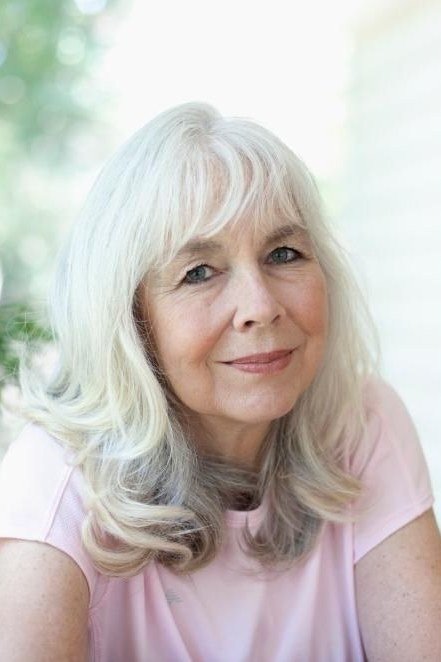 White Waves with Soft Bangs - long hairstyle for women over 60 with thin hair (white soft waves with bangs, front view)
