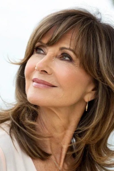 Brunette Layers with Curtain Bangs - long hairstyle for women over 60 with thin hair (brown layered long with curtain bangs, front view)