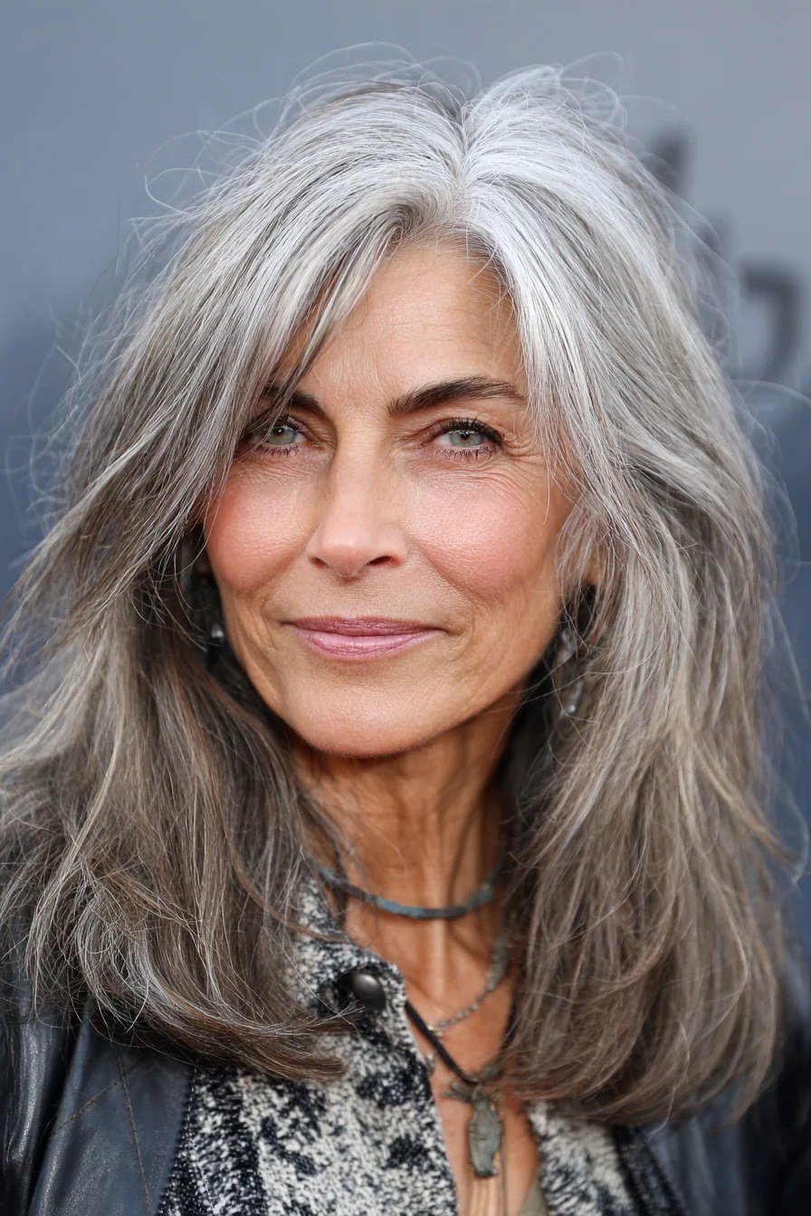 Grey Wavy Layers - long hairstyle for women over 60 with thin hair (grey wavy long hair, front view, soft curls)