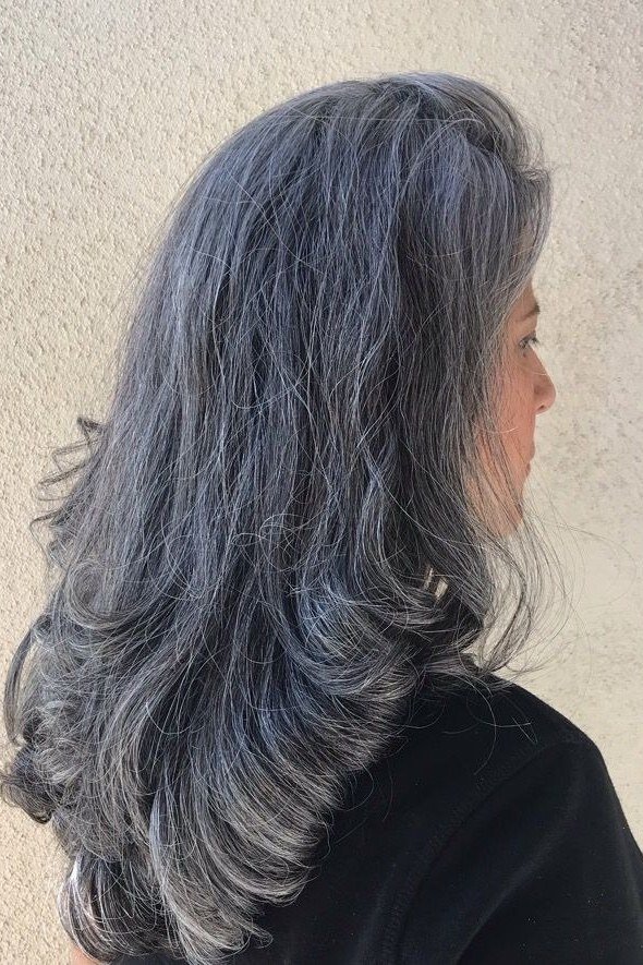Grey Layered Flow - long hairstyle for women over 60 with thin hair (grey layered long hair, side view)