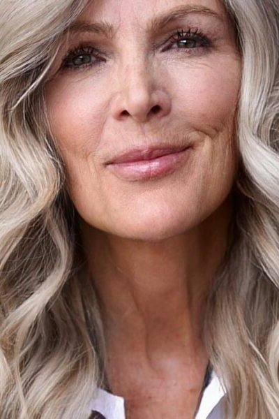 Layered Silver Ends - long hairstyle for women over 60 with thin hair (silver wavy long hair, front view, layered ends)