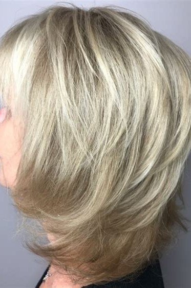 Blonde Side-Swept Cut - medium-length haircut for women over 60 with fine hair
