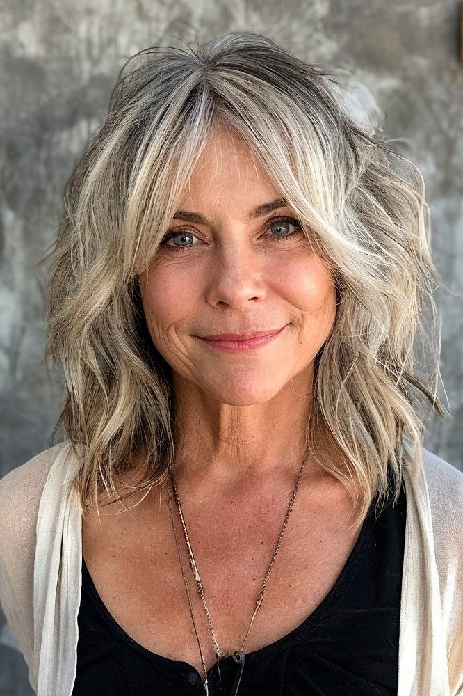 Silver Blonde Wavy Cut - medium-length haircut for women over 60 with fine hair