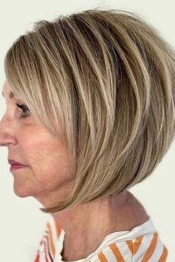 Highlighted blonde layered bob for women over 60