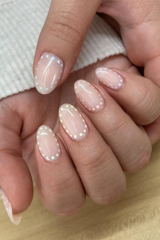 White Dotted Outline on Blush Pink minimalist nail art idea for women over 50