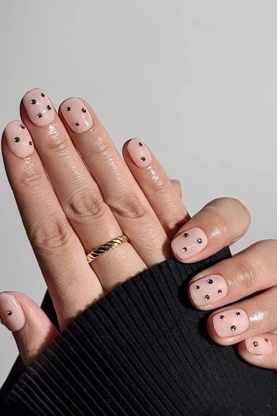 Black Dots Clustered at the Cuticle minimalist nail art idea for women over 50