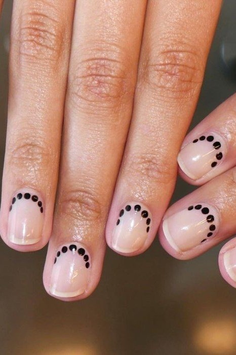 Black Dotted Smile-Line French minimalist nail art idea for women over 50