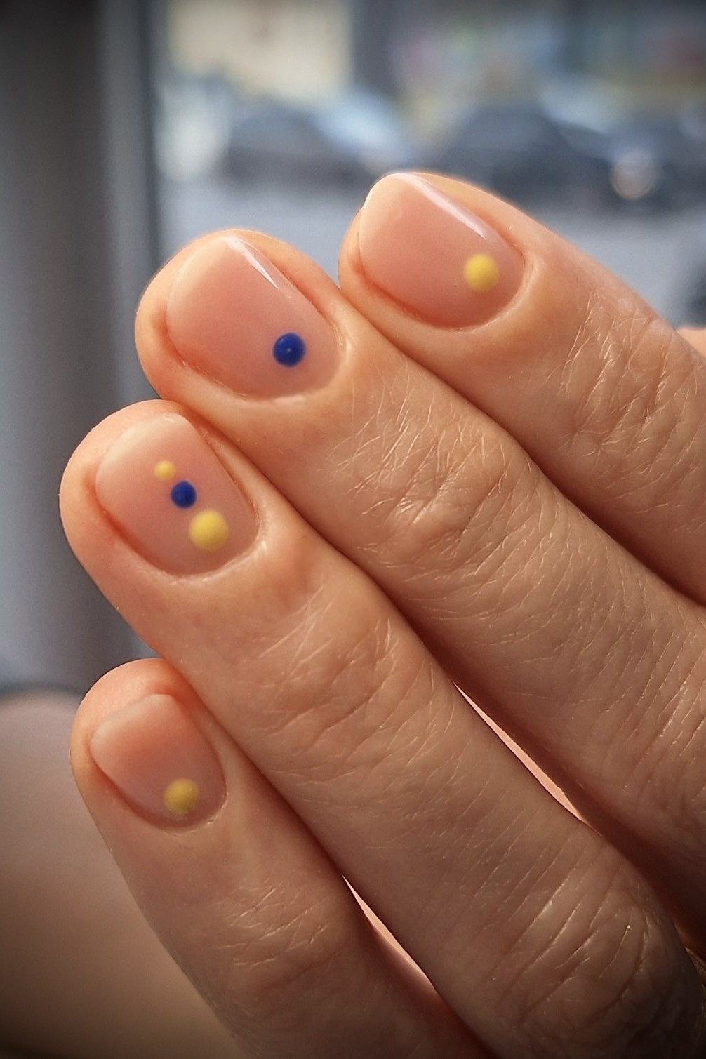 Tiny Colorful Dots in Blue and Yellow minimalist nail art idea for women over 50