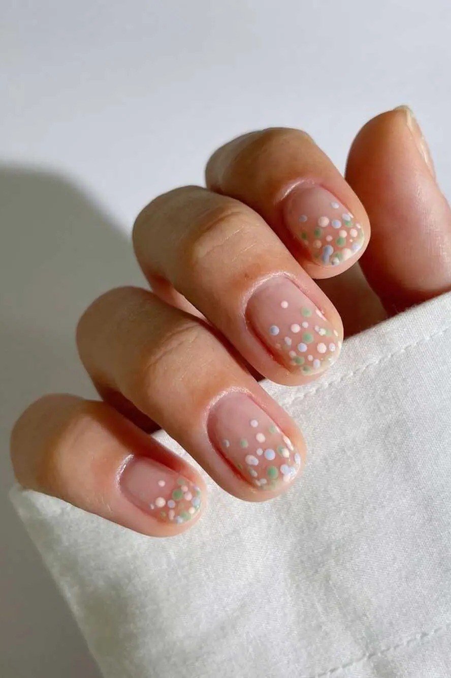 Fine Gold Specks on Sheer Pink minimalist nail art idea for women over 50