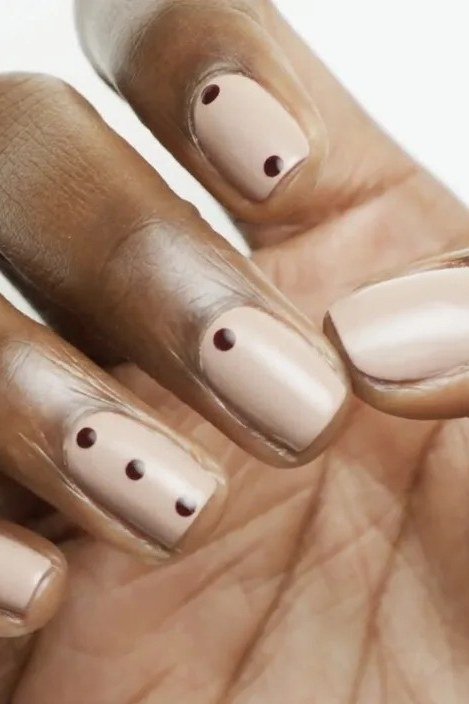 Gold Leaf Accent on One Nail minimalist nail art idea for women over 50