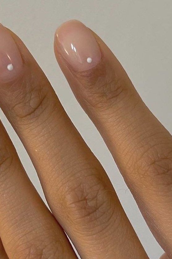 Delicate Gold Flakes on Clear minimalist nail art idea for women over 50