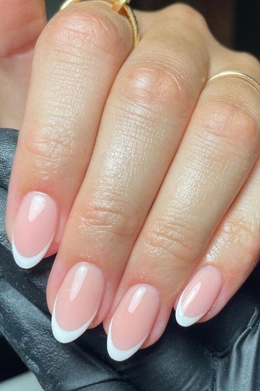 Thin Gold French Tips minimalist nail art idea for women over 50