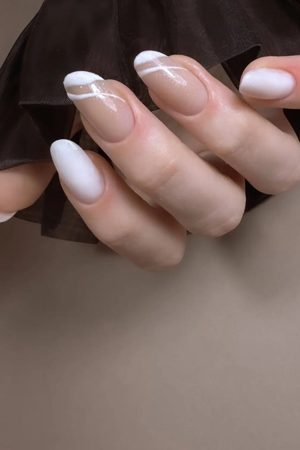 White Line Art on Nude minimalist nail art idea for women over 50