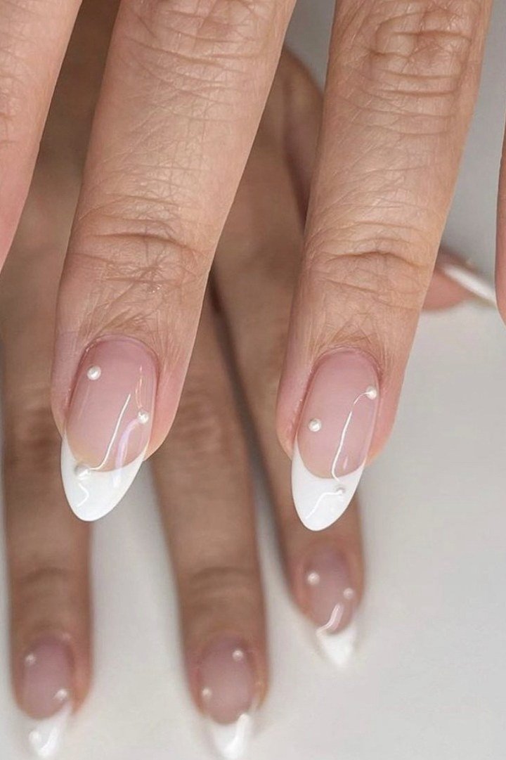 White V-Shaped French Tips minimalist nail art idea for women over 50