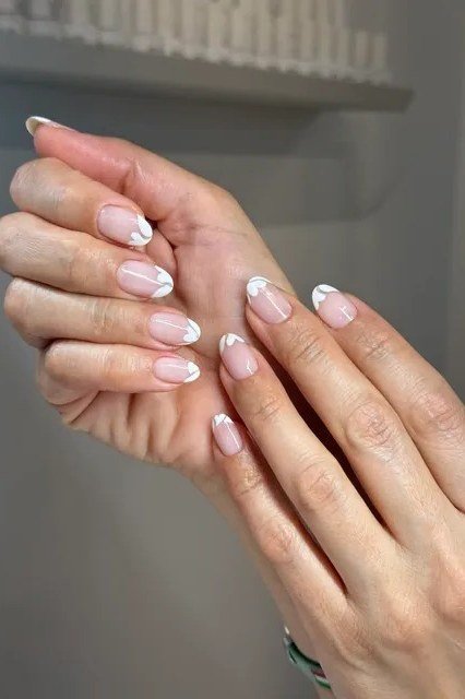 White Micro Line French minimalist nail art idea for women over 50