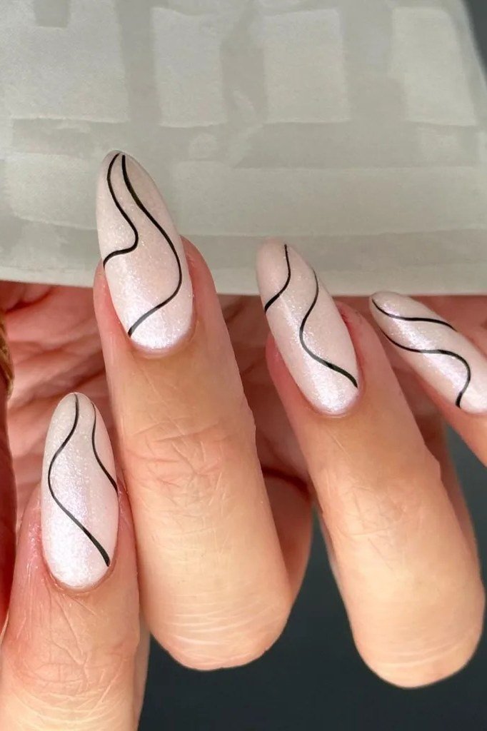 Black Wavy Lines on Nude Almond minimalist nail art idea for women over 50