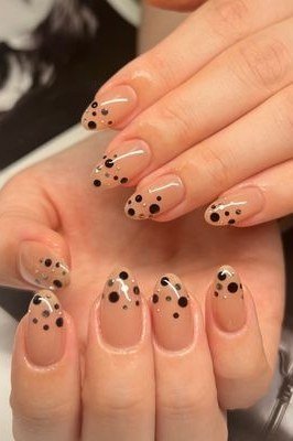 Black Dots at the Tips on Sheer Nude minimalist nail art idea for women over 50