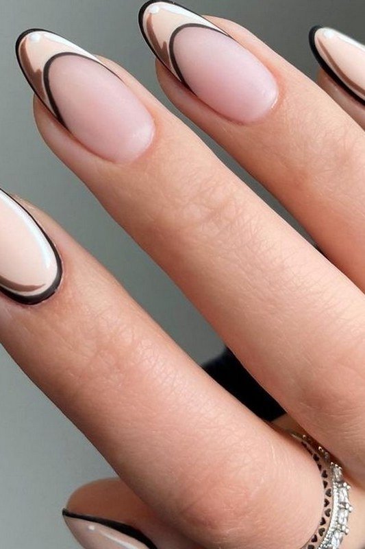 Black Outline on Nude Almond minimalist nail art idea for women over 50