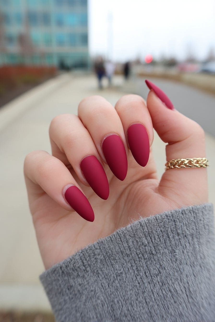 Raspberry red short oval nails for women over 50 - classy winter nail idea 8