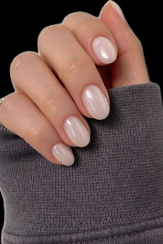 Pearl white almond glossy nails for women over 50 - classy winter nail idea 41