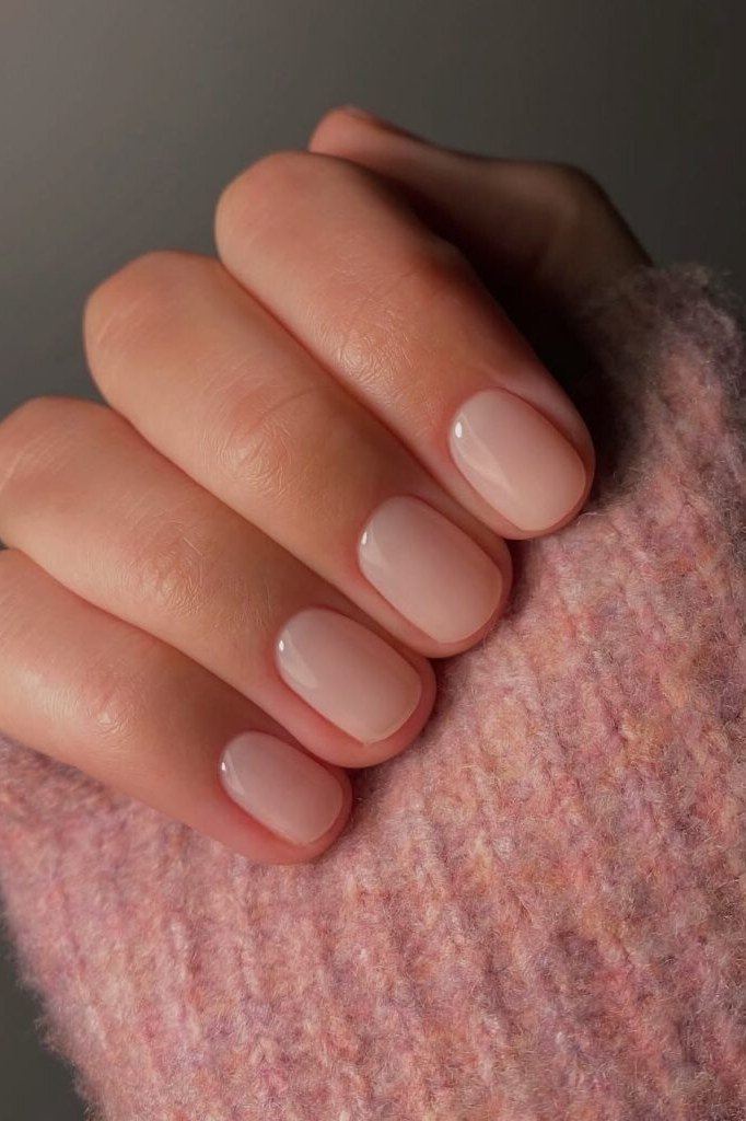 Nude short oval nails for women over 50 - classy winter nail idea 47