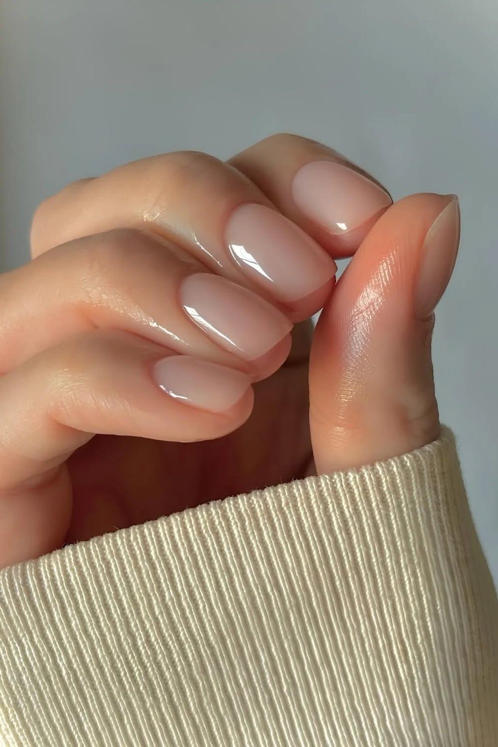 Nude almond glossy nails for women over 50 - classy winter nail idea 48