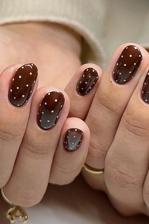 Chocolate brown polka dots nails for women over 50 - classy winter nail idea 53