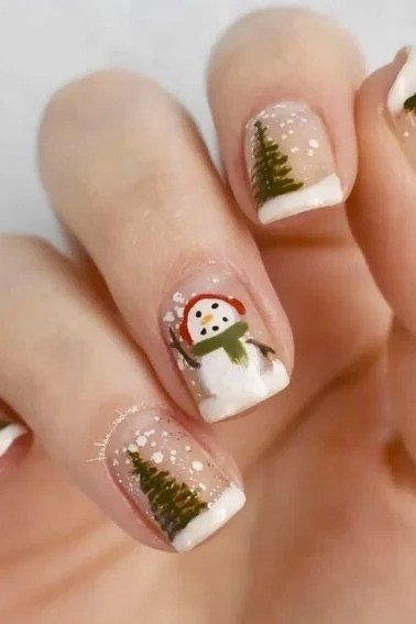 Nude with snowman and tree art nails for women over 50 - classy winter nail idea 60